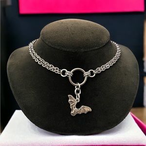 Double chain stainless steel cable link with Silver plated bat vampire charm .